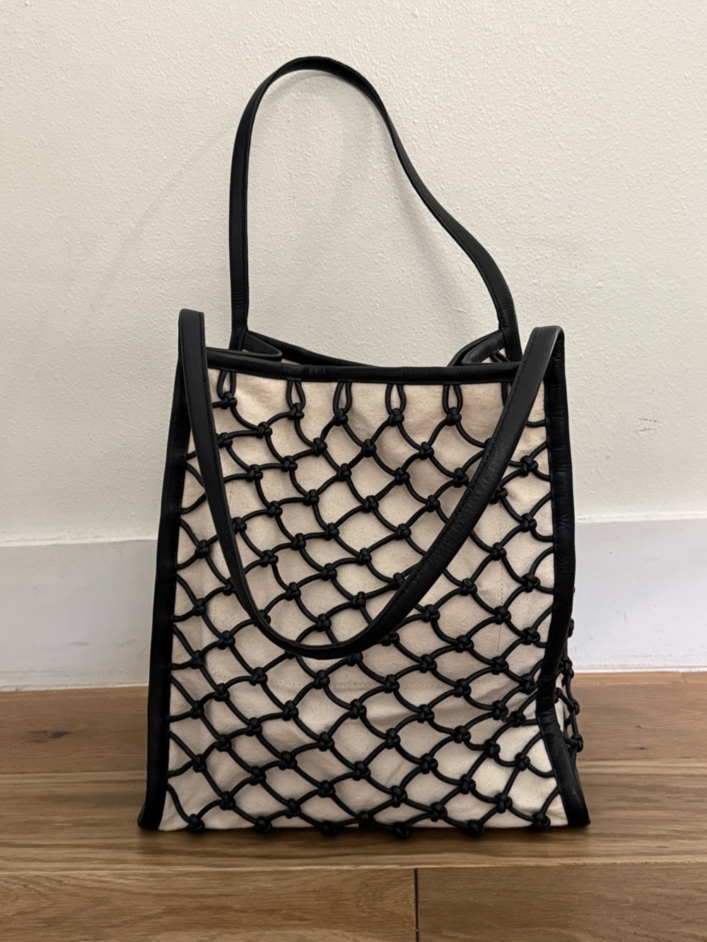 Madewell Black Knotted Leather Net Tote over Cream Canvas
